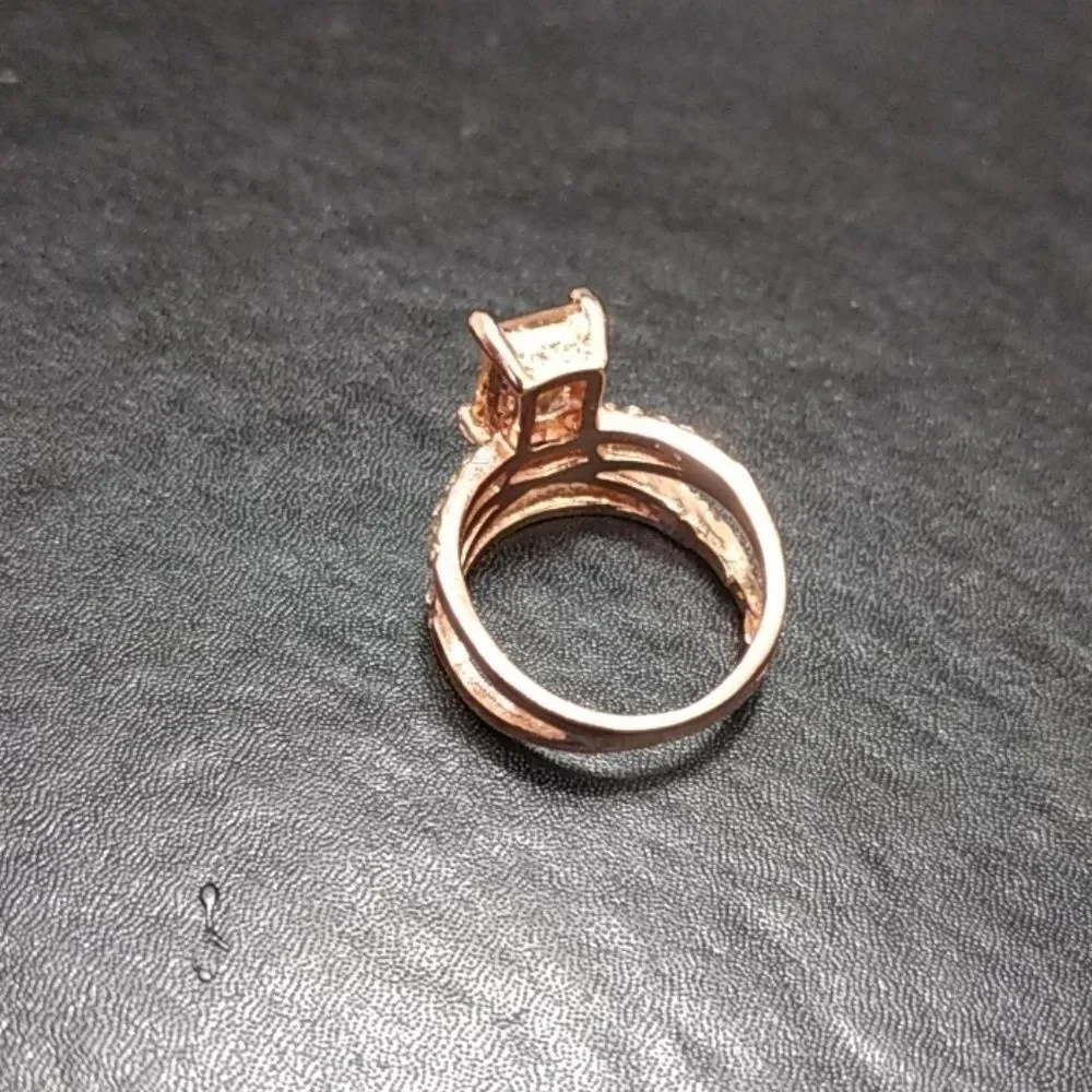 Rose gold colored ring with champagne stone Size 6